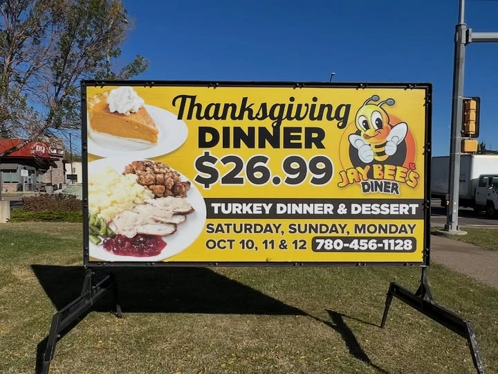 Custom portable sign and mini billboard advertising a business to local traffic