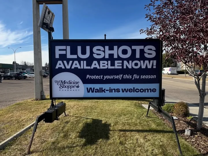 A temporary outdoor sign set up safely away from public property lines according to local bylaws